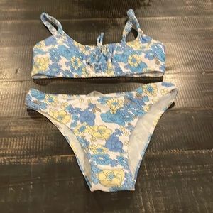 Women’s two piece, blue white swimsuit, size medium new without tags
